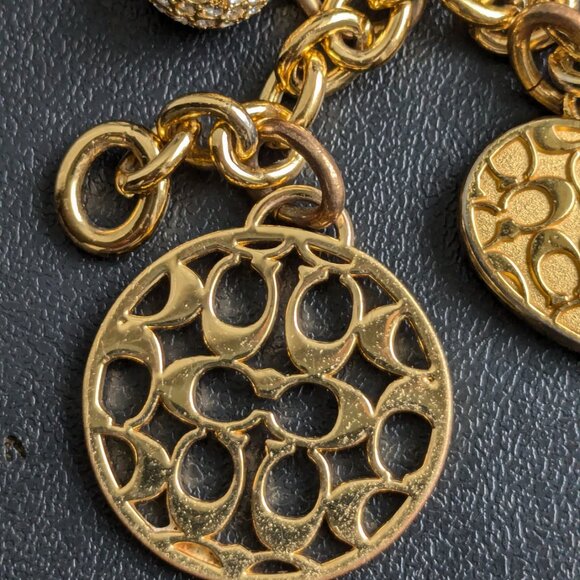 COACH Gold Tone Multi Charm Bracelet, Pouch & Original Box - Picture 8 of 10